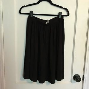 Black jersey knit midi skirt